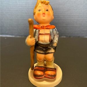 Charming Figurine with Orange and Brown Accents